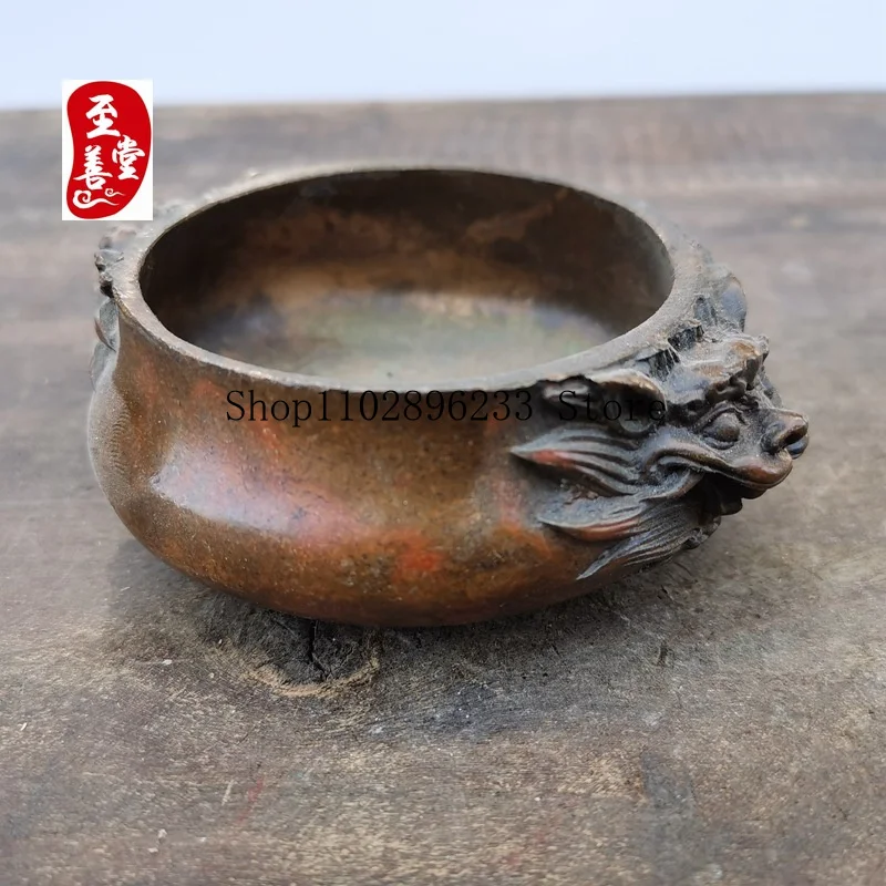 Antique-style copper alloy decorative piece for living room, featuring a dragon head and ear-shaped design, with an aged patina1