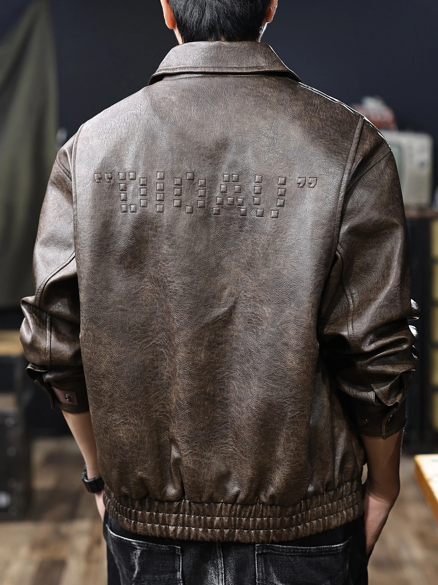 Cappotto da uomo in pelle PU vintage americana di fascia alta Jaet Faionable ricamato patchwork vestibilità ampia lungo Sve Retro Sle