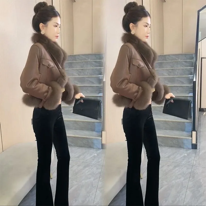 2026 Winter Female New Light Luxury Stand Up Collar Jacket Women's Fashion Luxury Sense Small Imitation Fur Integrated Warm Top