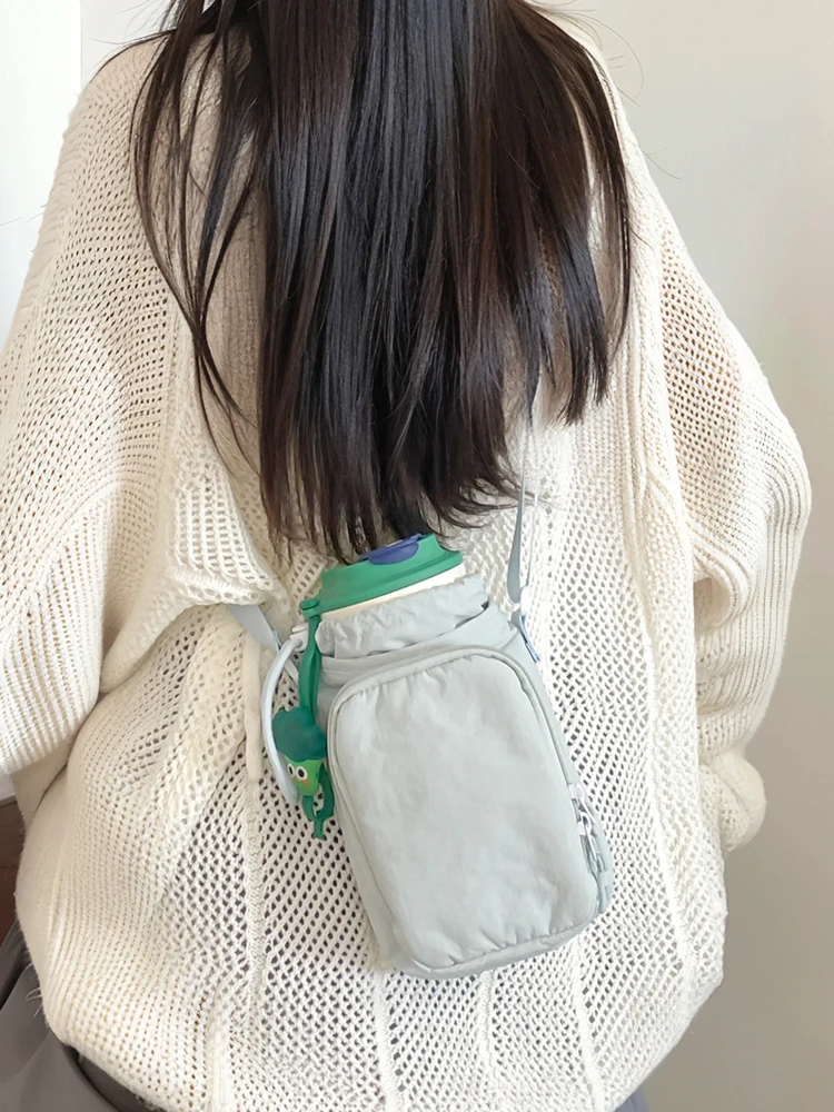 Nouveau 2025 sac à bandoulière pour femmes sac de bouteille d'eau isolé Portable Sports de plein air voyage sac de marche pour bébé sac de téléphone Portable