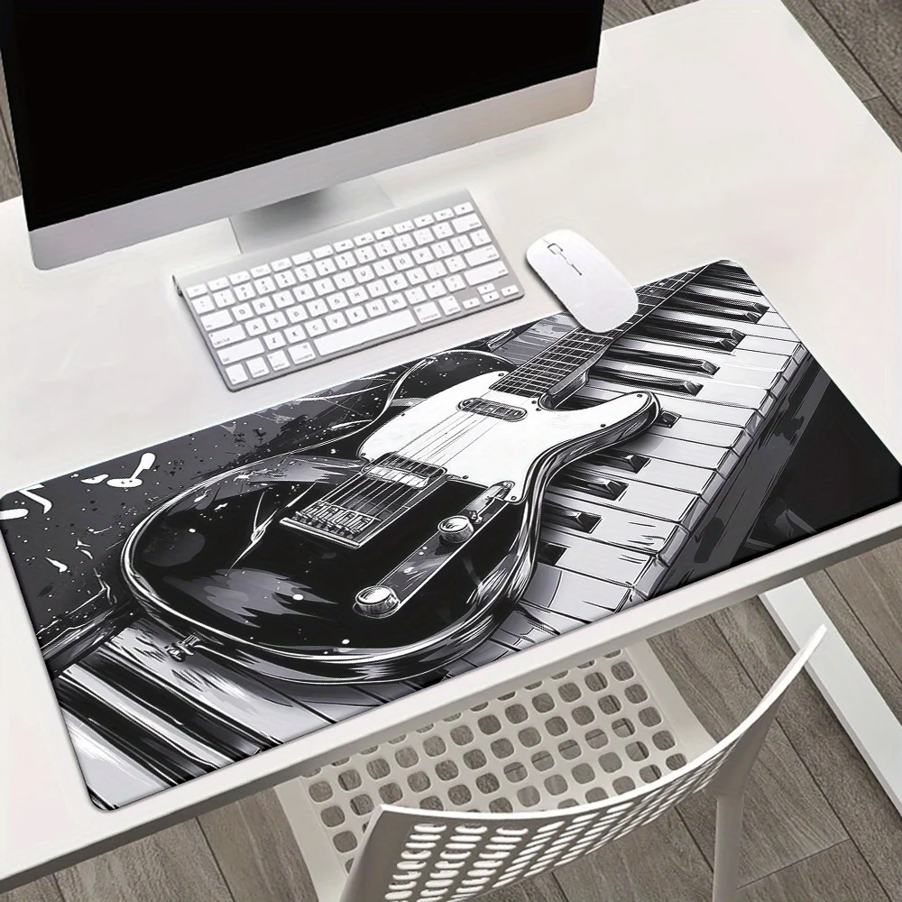 

The large guitar and piano design game mouse pad with anti-slip rubber is suitable for high-quality use in offices and homes