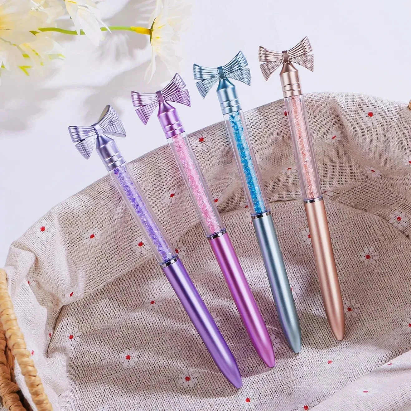 4Pcs/Lot Cute Bowtie Rotating Ballpoint Pen Blue Ink Writing Oil Pens Crystal Flowing Sand Diamond School Office Supplies Gift