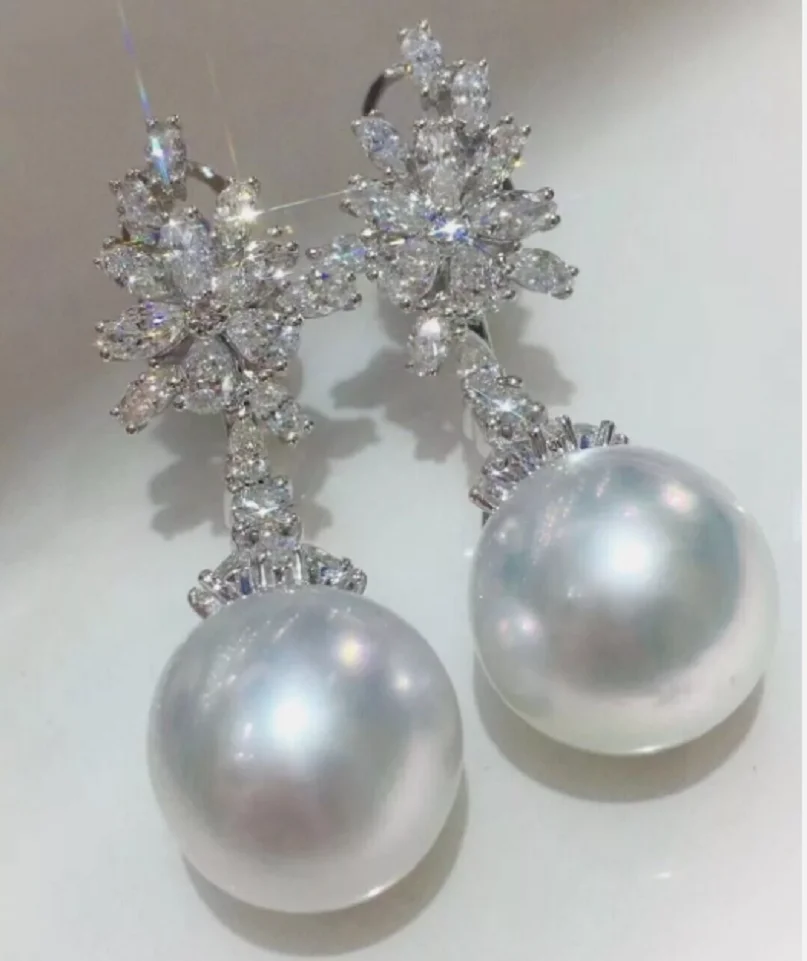 ضخمة AAAAA 10-11mm ريال جنوب البحر الطبيعي الأبيض حلق اللؤلؤ 925s..