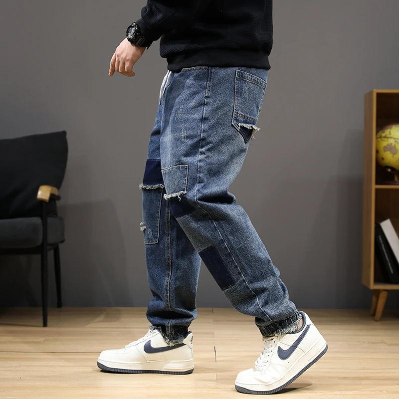 عداء ببطء الجينز الرجال الدنيم السراويل حجم كبير 8XL موضة المرقعة الجينز عادية مرونة الخصر الدنيم السراويل الذكور سراويل كبيرة الحجم