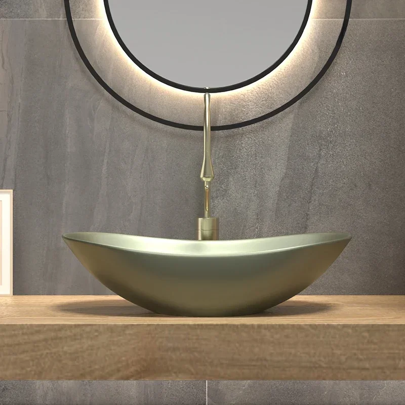 Oval art basin light luxury ceramic household table basin olive nut green metal texture hotel style