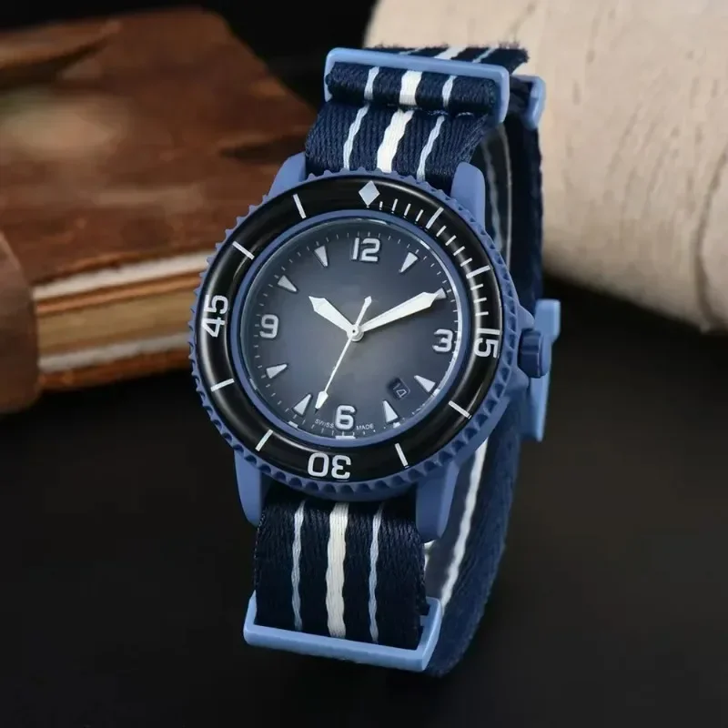 2025 Reloj de cuarzo Ocean Explorer para hombre, caja con patrón marino, indicador de fecha trasera, correa de tela, resistente al agua, estilo informal de buzo