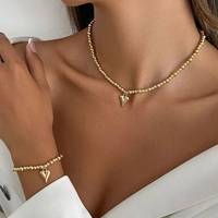 Salircon 2Pcs/Set Creative Metal Love Heart Pendant Choker Necklace Bracelet Women Punk Bangles Grunge Jewelry Set Accessories