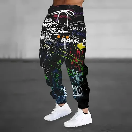 Los nuevos pantalones largos de otoño 2026 para hombre son patinadores deportivos e informales, moda urbana al aire libre y estampado de grafiti 3D