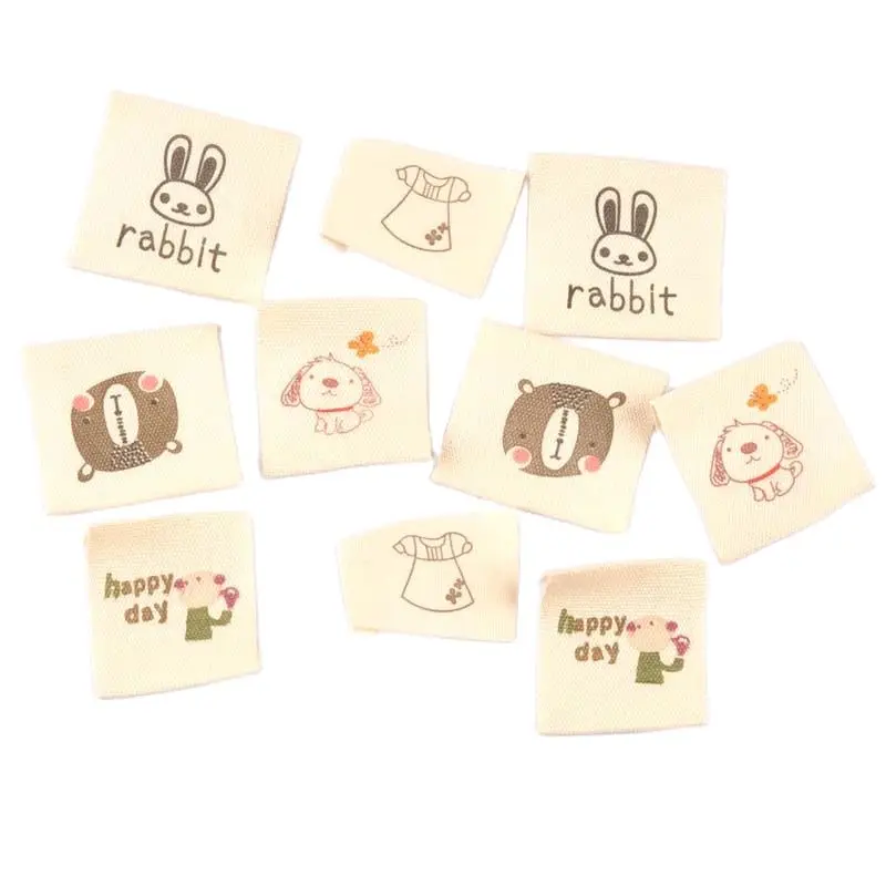 50pcs Beige Cotton Woven Labels For Sewing Accessories Label Cartoon Animal Shoes Bags Washable Garment Fabric Tags Care C2181