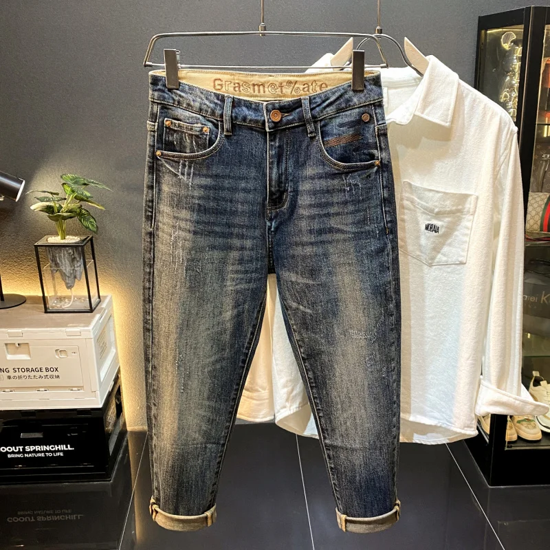 กางเกงยีนส์ทรงเกวงขาสั้นเก้าส่วนสไตล์อเมริกันสุดหรูสำหรับผู้ชาย รุ่นใหม่สุดเทรนด์ ทรงเข้ารูปสวยงาม สวมใส่สบายๆ