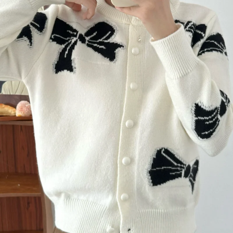 سترة جاكار محبوكة جديدة لربيع وخريف 2025 برقبة دائرية سترة جديدة فضفاضة قصيرة لطيفة