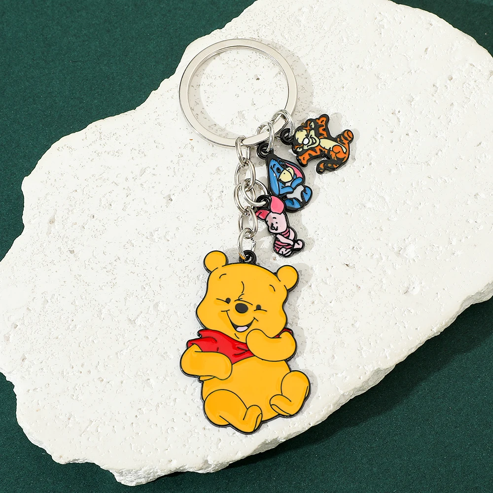 

Disney Winnie the Pooh Keychain, Classic Honey Pot Charm with Bees, Cute Cartoon Gift for Birthdays