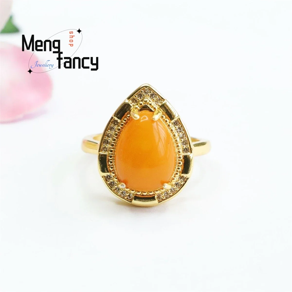 

Natural Old Material Honey Wax Amber Water Drop Egg Face Ring Simple Elegant Personalized Fashion Versatile Women Luxury Jewelry