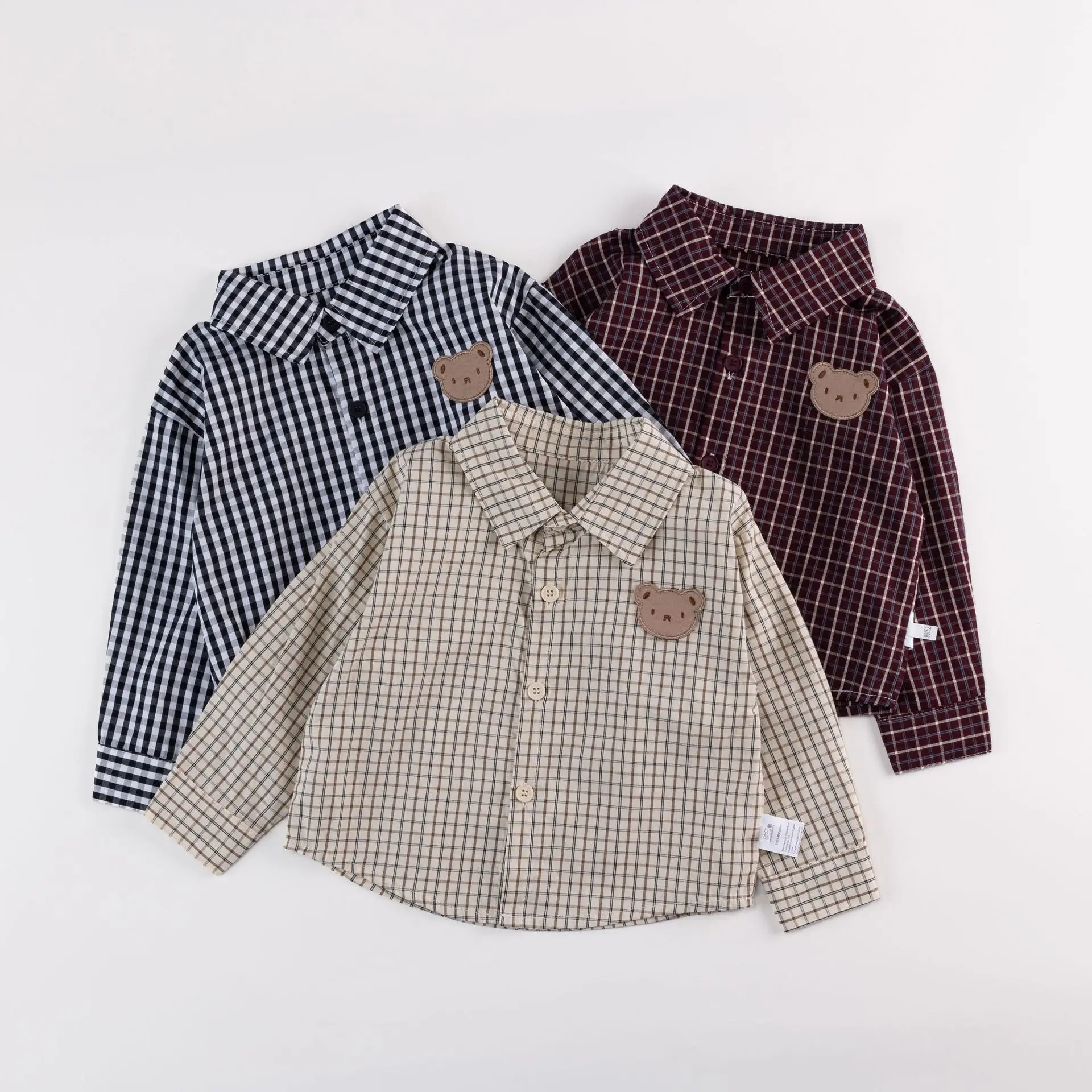 

Новая осенняя детская одежда для детей 0-3 лет, рубашки с длинными рукавами и лацканами, универсальные модные свободные рубашки в клетку.