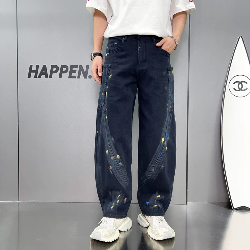 

High-end personalized dyeing hand-painted graffiti men's jeans Korean version of the influx of men loose straight men's pants