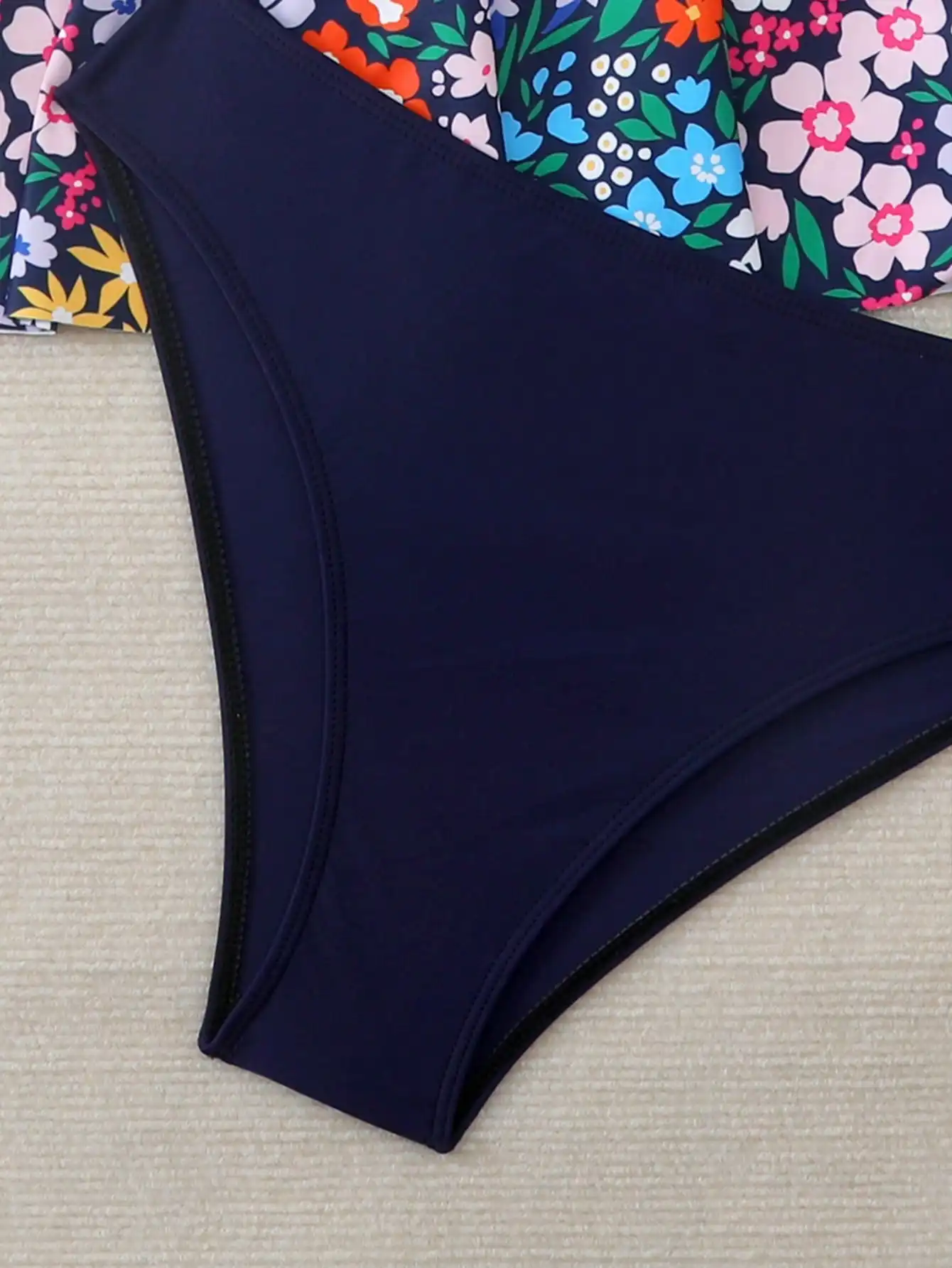 

Navy Blue Floral Two-Piece Swimsuit With Smocked Bodice, Backless Design, And Skirted Bottom For Beach Vacation