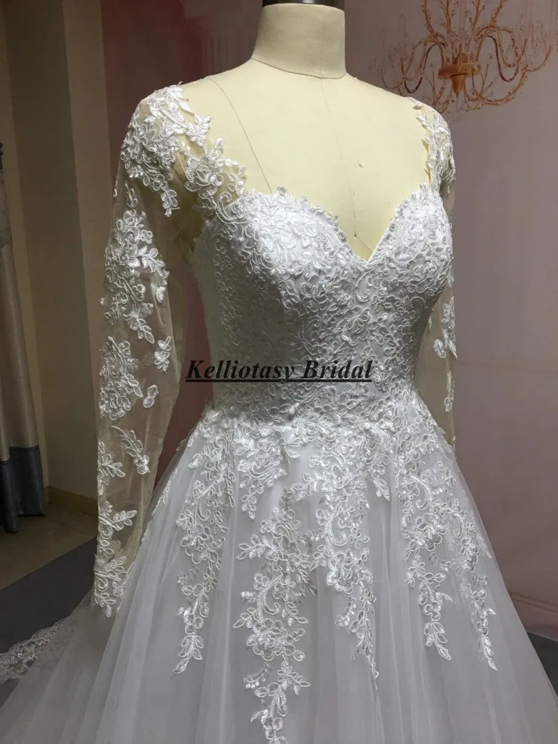 Vestido de novia hecho a medida con manga larga, vestidos de novia de tren largo con espalda con agujero