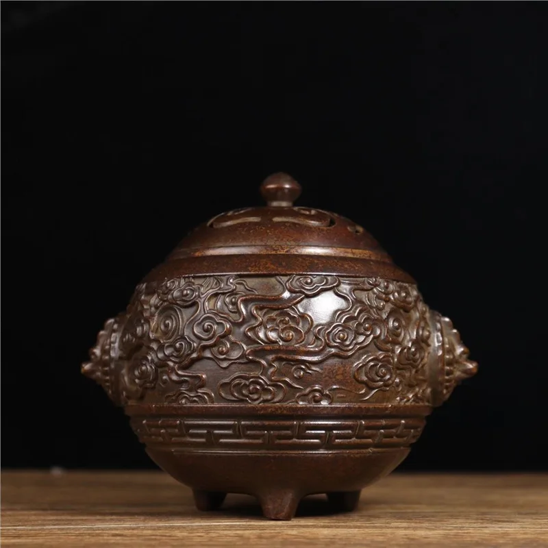 An exquisite Suzhou-style brass incense burner with dragon ears and three legs, an antique copperware ornament suitable for home