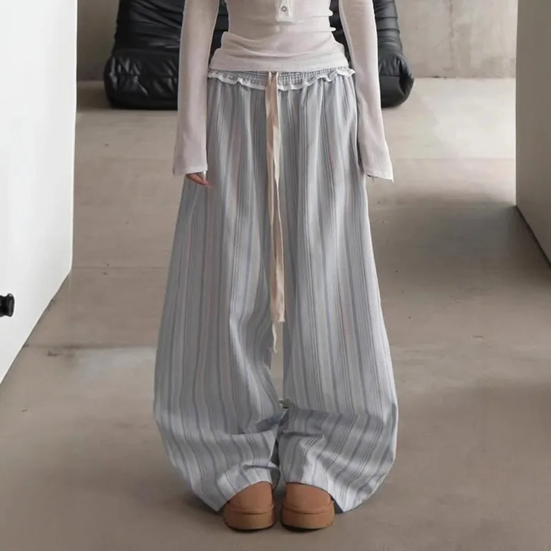 

American striped lace up woven pants with lazy vacation style, elastic wood ear splicing, loose sports straight leg pants