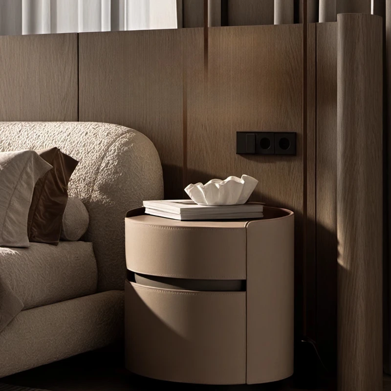 

Italian minimalist creative cylinder designer bedroom saddle leather premium bedside table light luxury storage cabinet