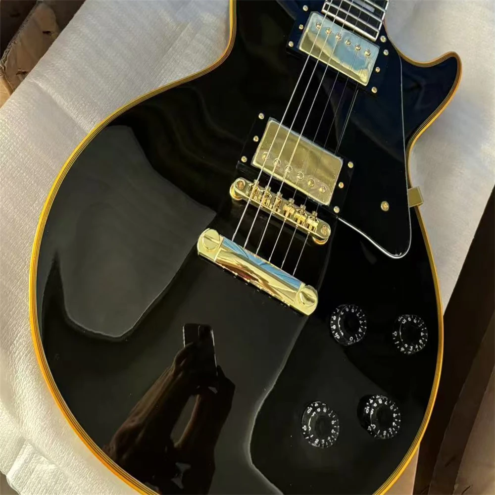 

black gold electric guitar Gold Bridge 6 strings, gold accessories