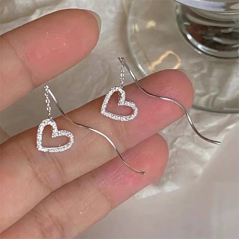 Exquisitos pendientes colgantes de cristal para mujer, aretes largos con borla de corazón, línea de oreja coreana, joyería de fiesta de moda, regalo para niñas