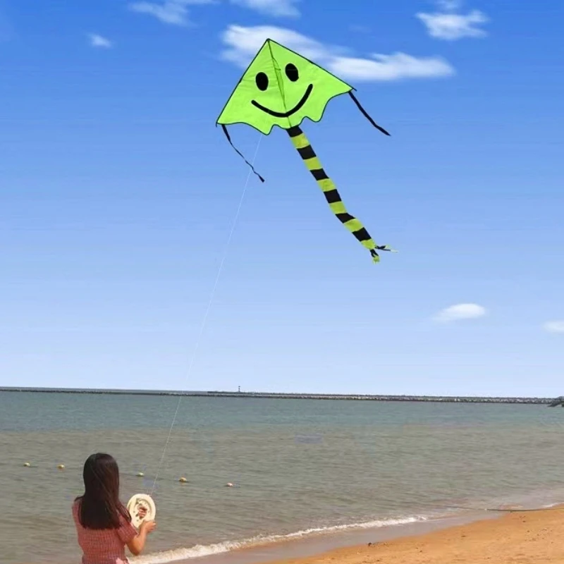 ว่าวหน้ายิ้ม ว่าวเด็ก ของเล่นว่าวแบบมีรอก ว่าวบินกลางแจ้ง ว่าวไนลอนริปสต็อป ว่าวปีกบิน สายร้อยว่าว ของเล่นว่าวการ์ตูน ว่าวรูปงู