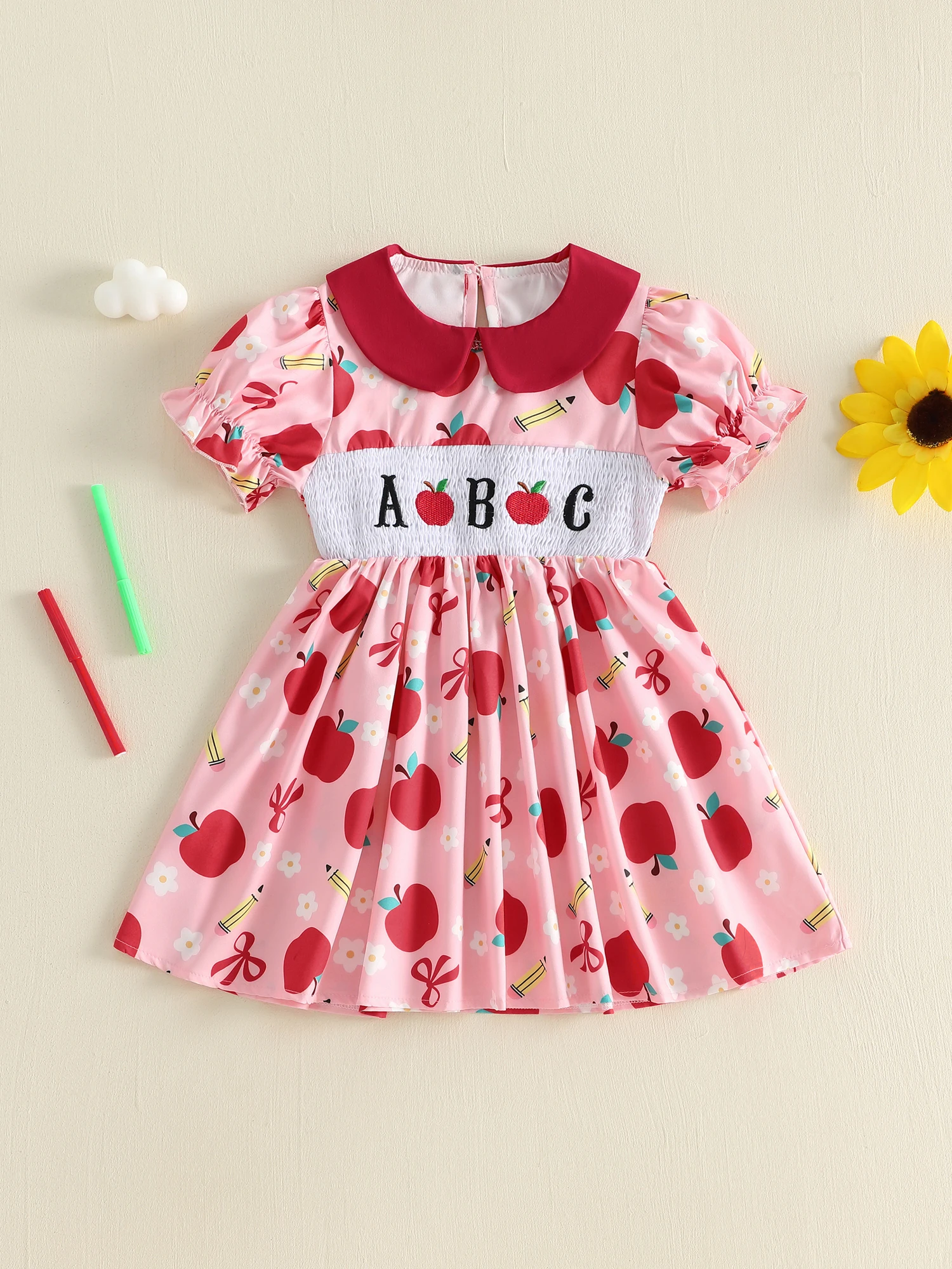 

Girls Short Sleeve Dress with Doll Collar Puff Sleeves Apple Embroidery and Smocked A-Line Design for Little Princesses