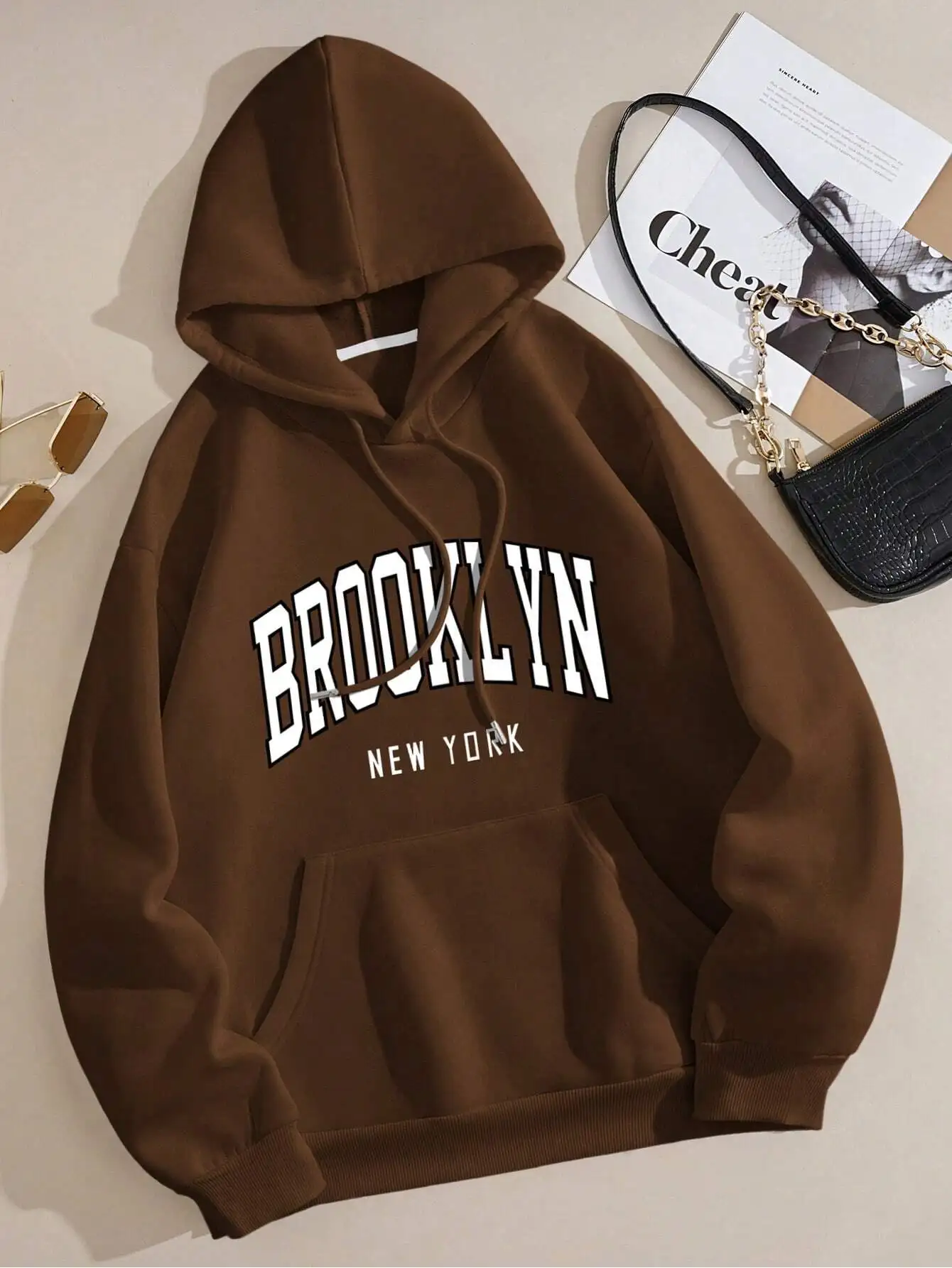 

Brown Oversized Hoodie with Arch Letter Graphic and Kangaroo Pocket