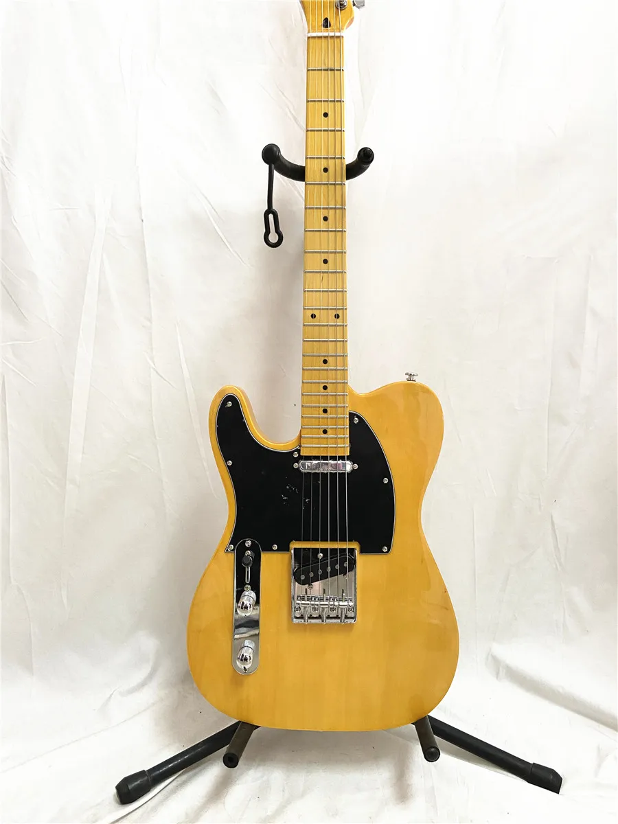 Custom left hand light yellow 6 string electric guitar maple neck black guard plate can be customized free shipping