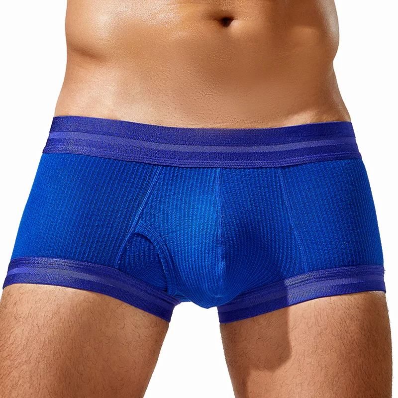 Sexy men\'s boxer shorts with low waist and comfortable front opening pockets, breathable scrotum and hip lifting triangle pants