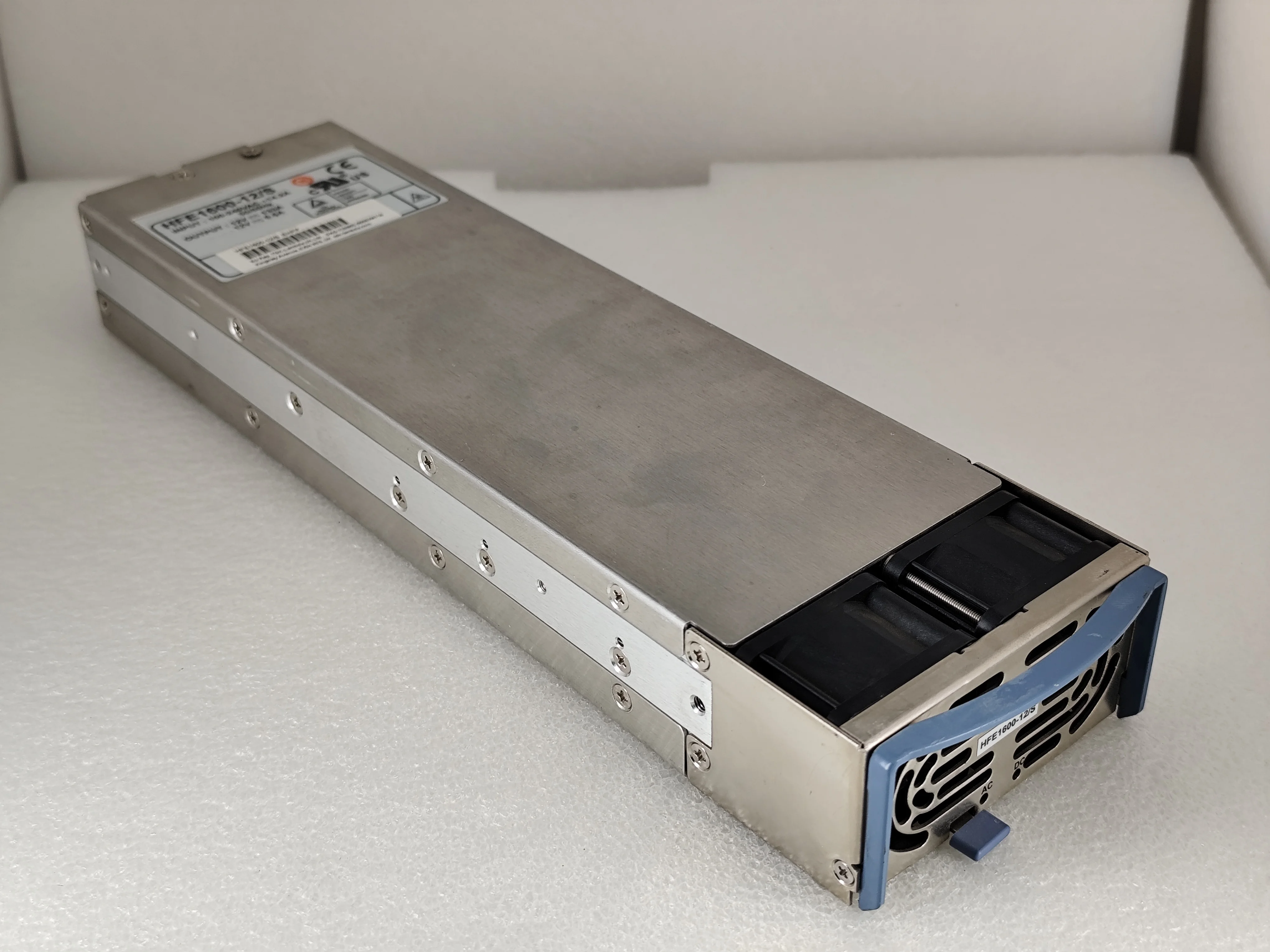 hfe1600-12-s-ac-dc-power-supply-12v-133a-170-265v-enclosed-cage-front-hfe1600-series