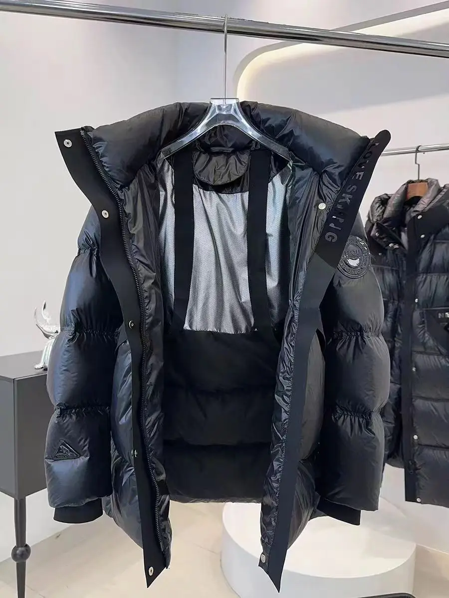 Chaqueta de plumón negra brillante para mujer, chaqueta de plumón informal con capucha para tiro callejero, nueva versión coreana 2024