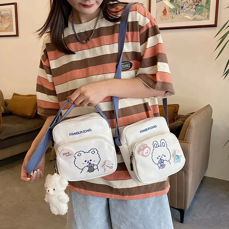 Tas selempang ponsel wanita, tas kanvas kecil wanita, motif kartun Korea, tas tangan kain Mini beruang kelinci untuk Gadis imut