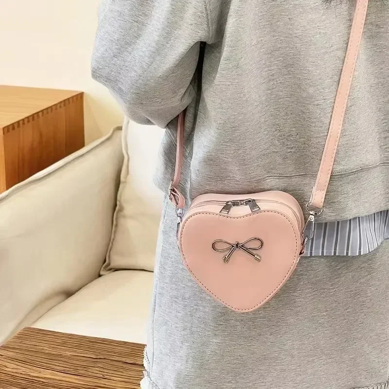 Bolsos de hombro para mujer con cremallera de PU de Color sólido con forma de corazón, bolsos nuevos de leopardo de gran capacidad de alta calidad para mujer, gran oferta 2025