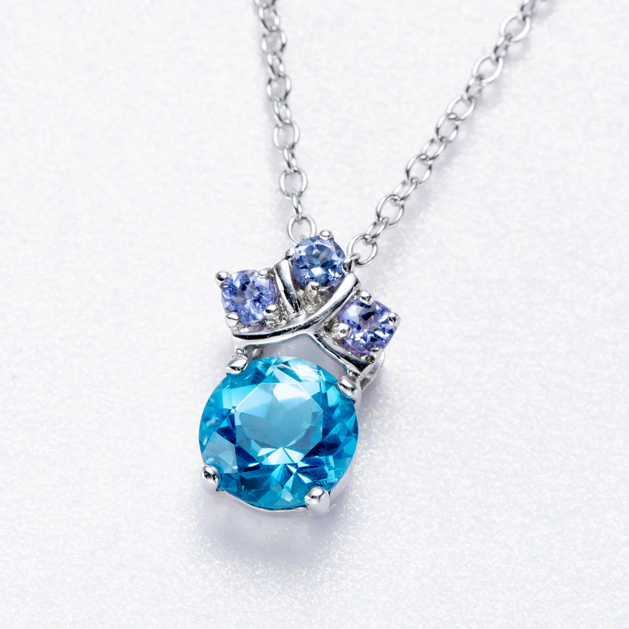 

Swiss Blue Topaz and Tanzanite Rhodium Over Sterling Silver Pendant with Chain