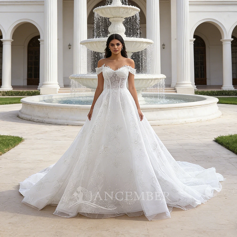 

Свадебное платье А-силуэта на заказ с открытыми плечами, на шнуровке, с вырезом «принцесса», со шлейфом.