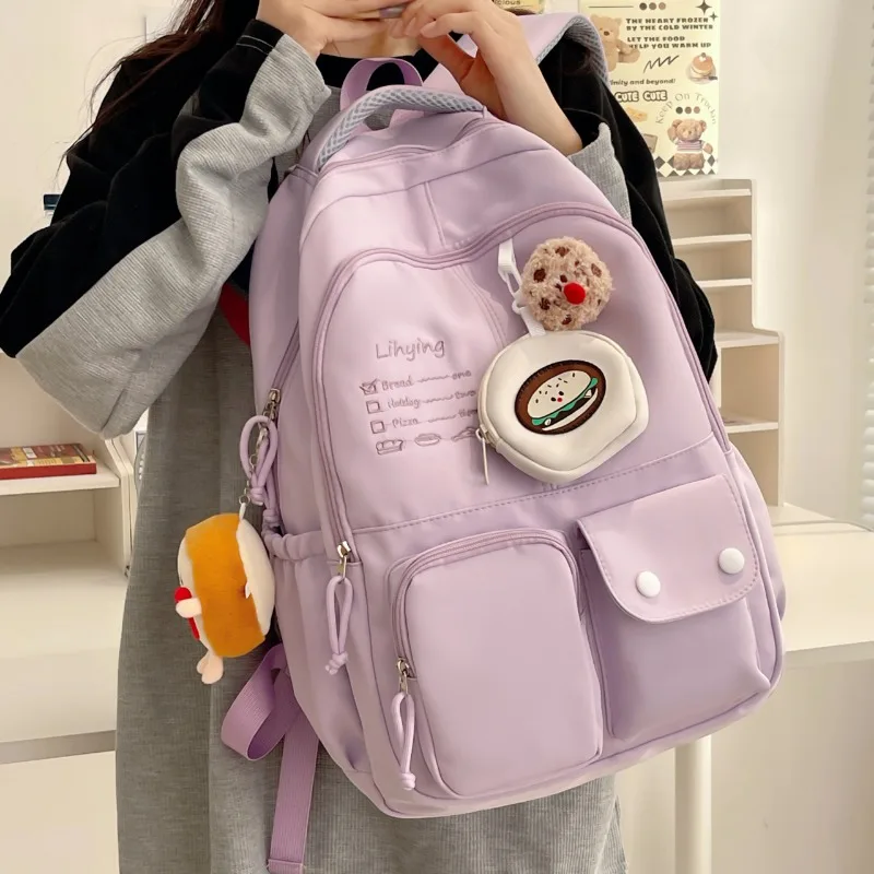 Mochila escolar Kawaii para estudiantes universitarios, morral de viaje ligero de gran capacidad con bonito colgante para adolescentes