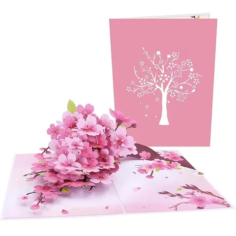 An elegant 3D holographic greeting card of cherry blossoms, accompanied by an envelope and a note card