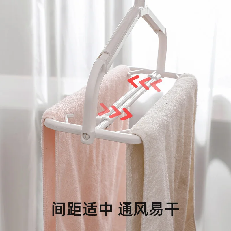 

Stretchable folding clothes hanger plastic household retractable towel hanger bath towel windproof hanging clothes hanger drying