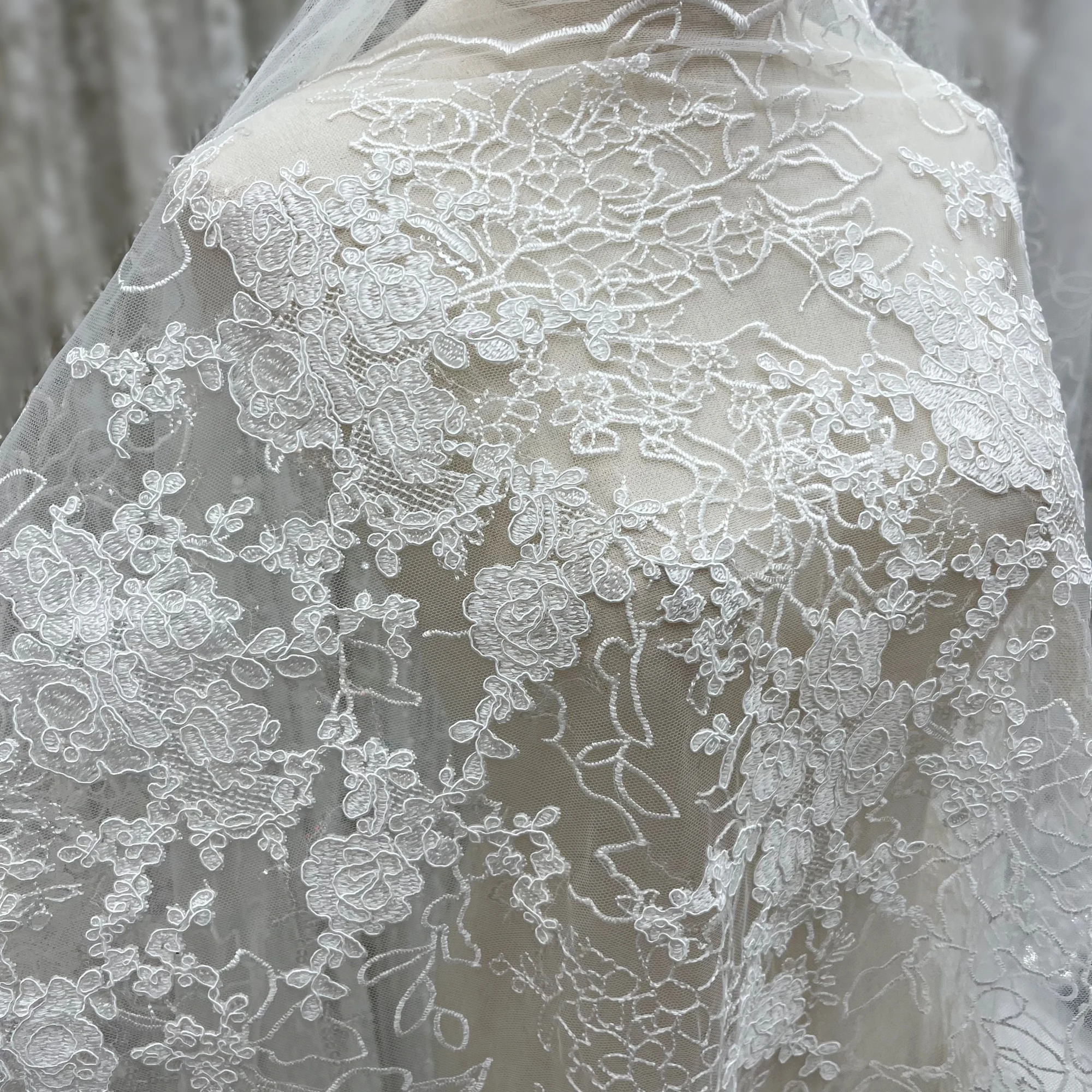 

New trendy sequined tulle embroidery, suitable for wedding dress fabrics, custom-made women's clothing fabrics