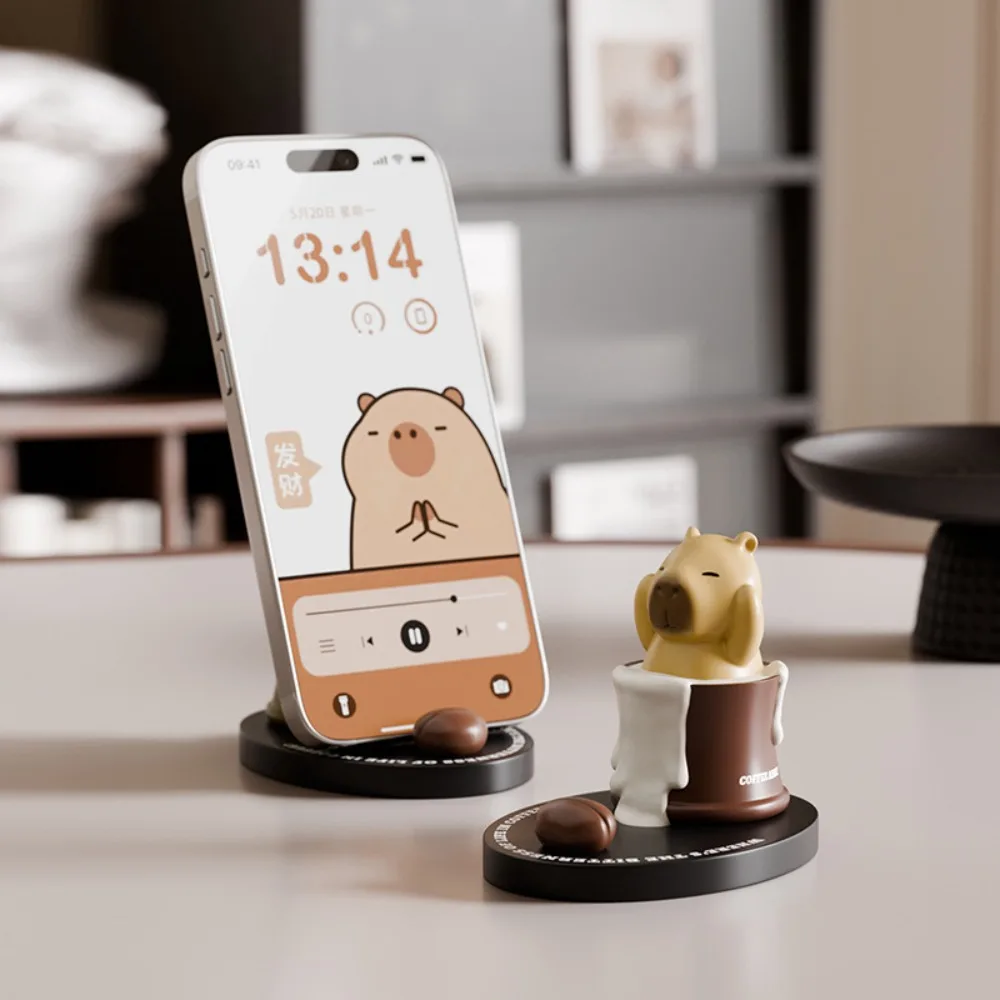 

Coffee Cup Capybara Doll Phone Holder Animal Figurines Desk Decor Capybara Mobile Phone Stand Cartoon Creative Capybra Model Toy