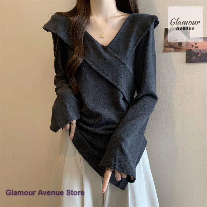

Korean retro style fashion design sense V-neck irregular long-sleeved T-shirt women's spring and autumn new waist jacket