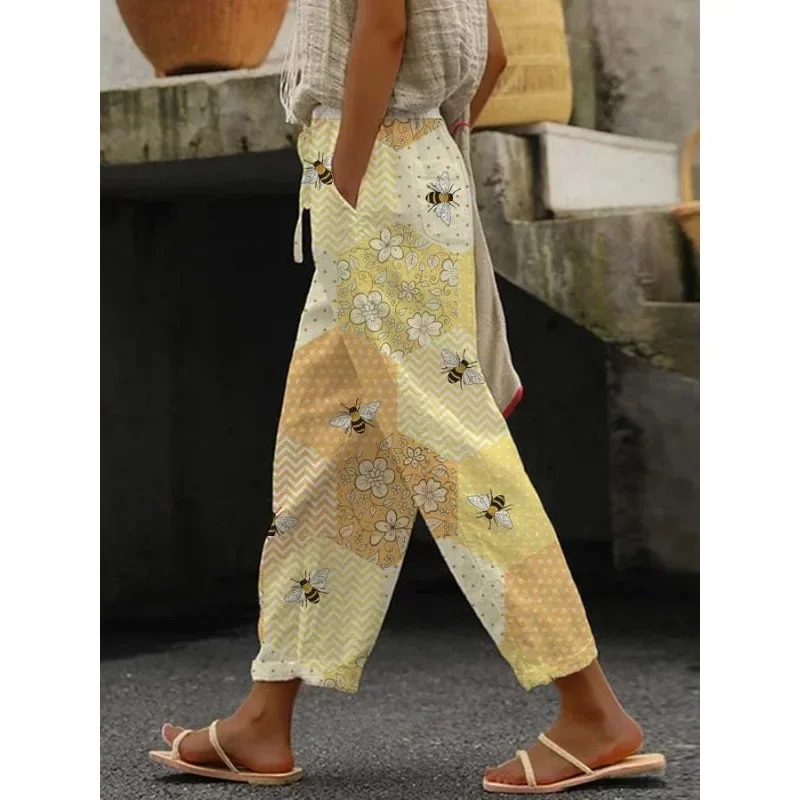 Pantaloni a gamba larga con stampa floreale con motivo floreale Pansy da donna pantaloni Casual con bottoni estivi Cool pantaloni retrò alla moda con stampa floreale botanica