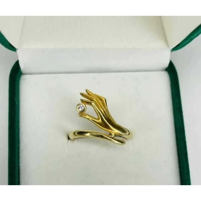 925 silver ring, handcrafted, with a small moissanite as the main stone, accompanied by a certificate, and customizable. view 2