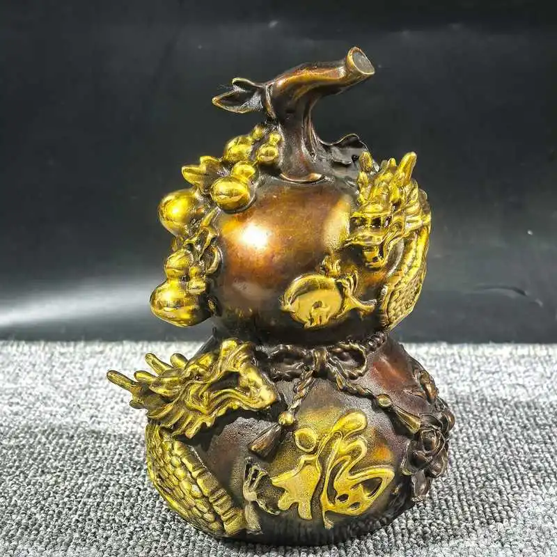 Gilt Bronze Fortune, Prosperity, and Longevity Gourd Ornament with Three-Dimensional Relief of Two Dragons Playing with a Pearl
