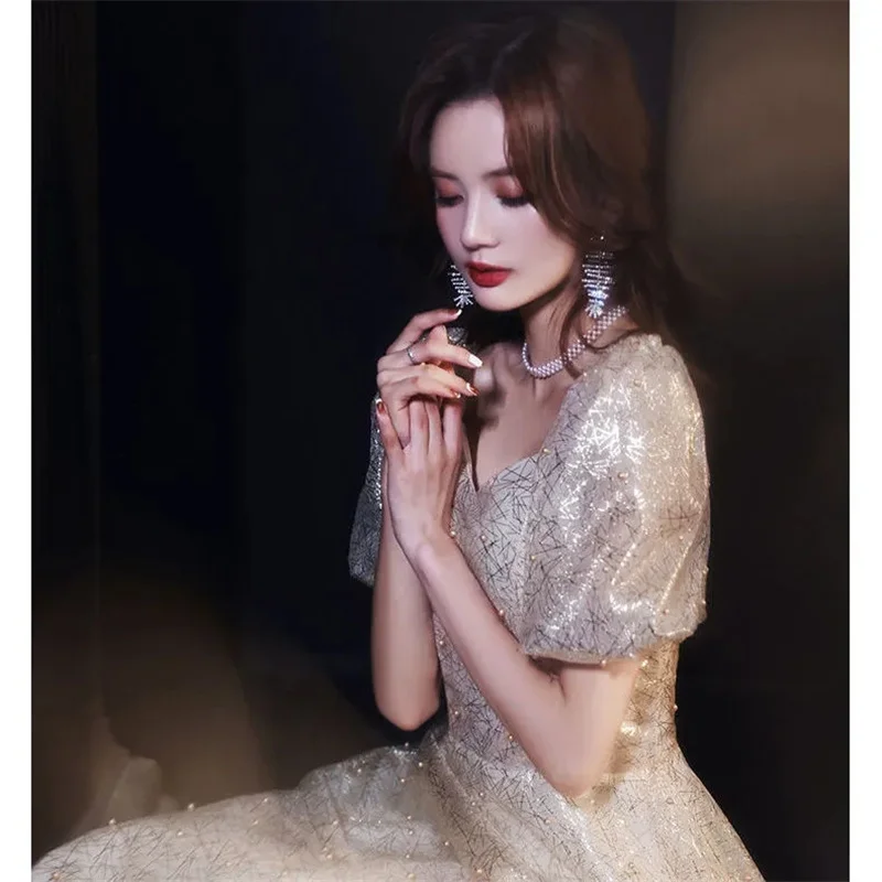 

Banquet evening dress female 2022 new champagne color fairy presided over long tutu skirt annual meeting performance skirt