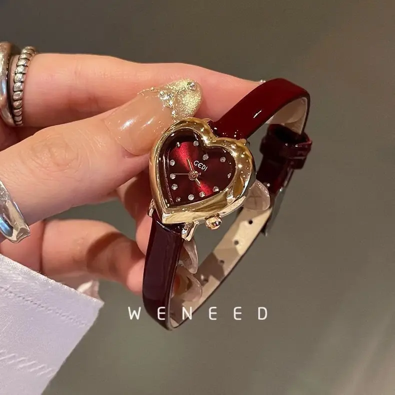 

Женские часы Weneed Retro с маленьким циферблатом, легкие, роскошные, нишевый дизайн в форме сердца, изысканный тонкий ремешок