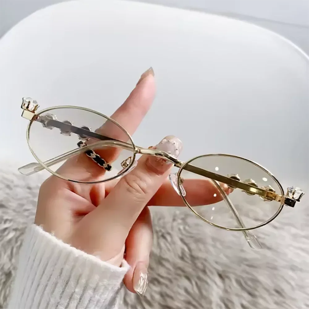 نظارات شمسية فاخرة بإطار بيضاوي معدني ماسي للنساء بإطار صغير نظارات شمسية بيضاوية UV400 نظارات خارجية عتيقة #1