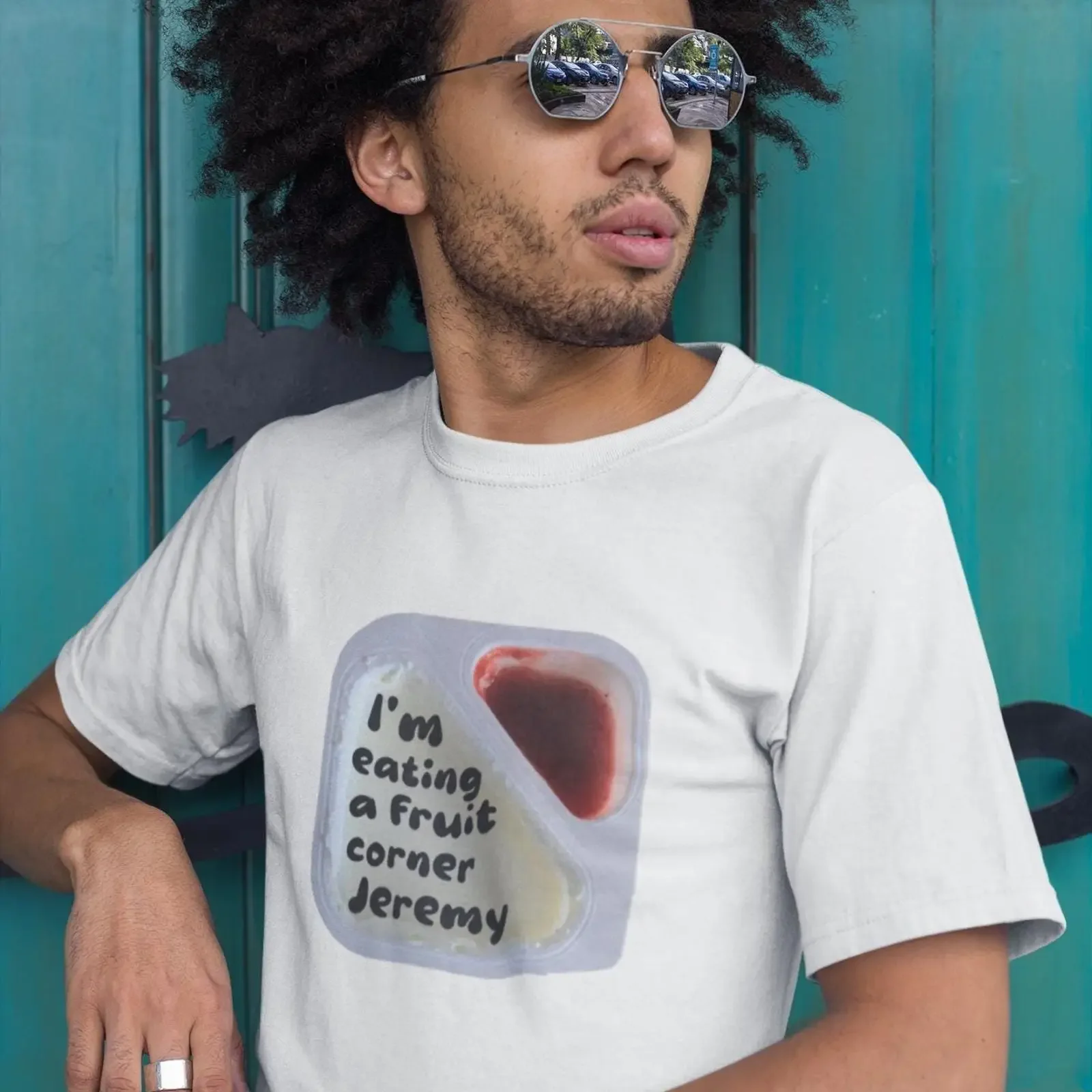 May include A white t shirt with graphic of plastic container the text I'm eating fruit corner Jeremy vintage Washed Casual